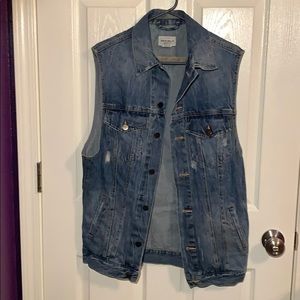 Long sleeveless jean jacket